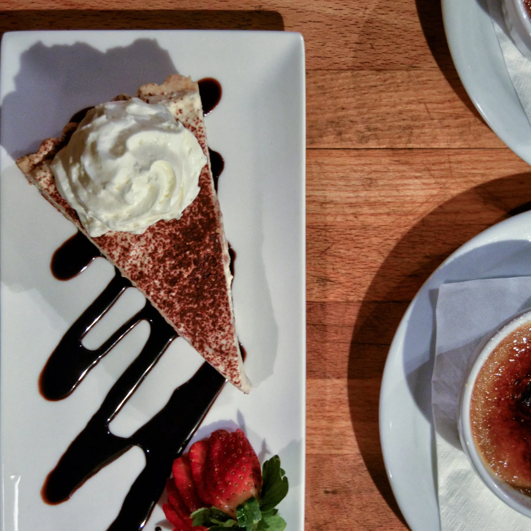 A chocolate torte finished with cream